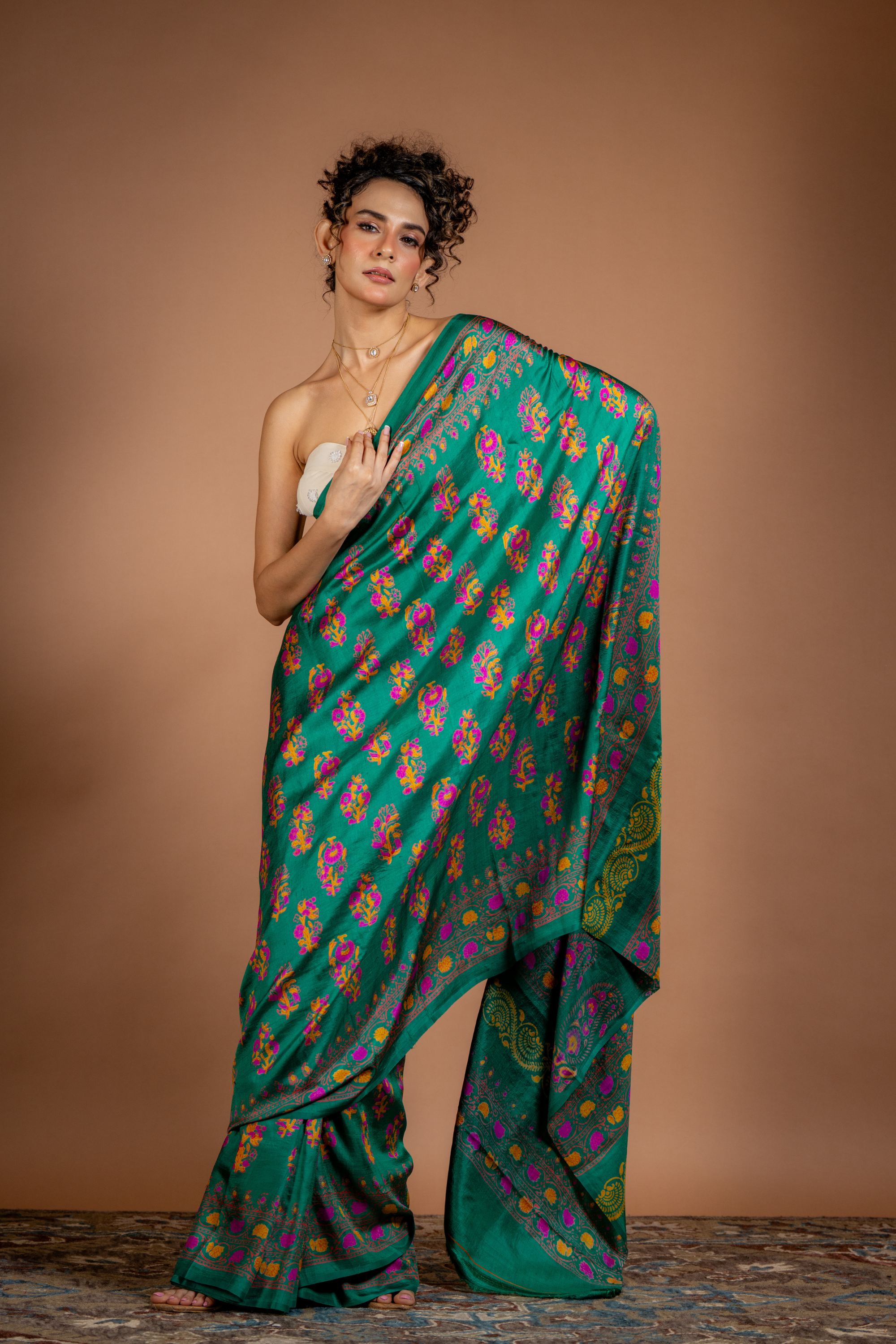 Emerald Radiance Silk Saree: A Symphony of Colour and Craft