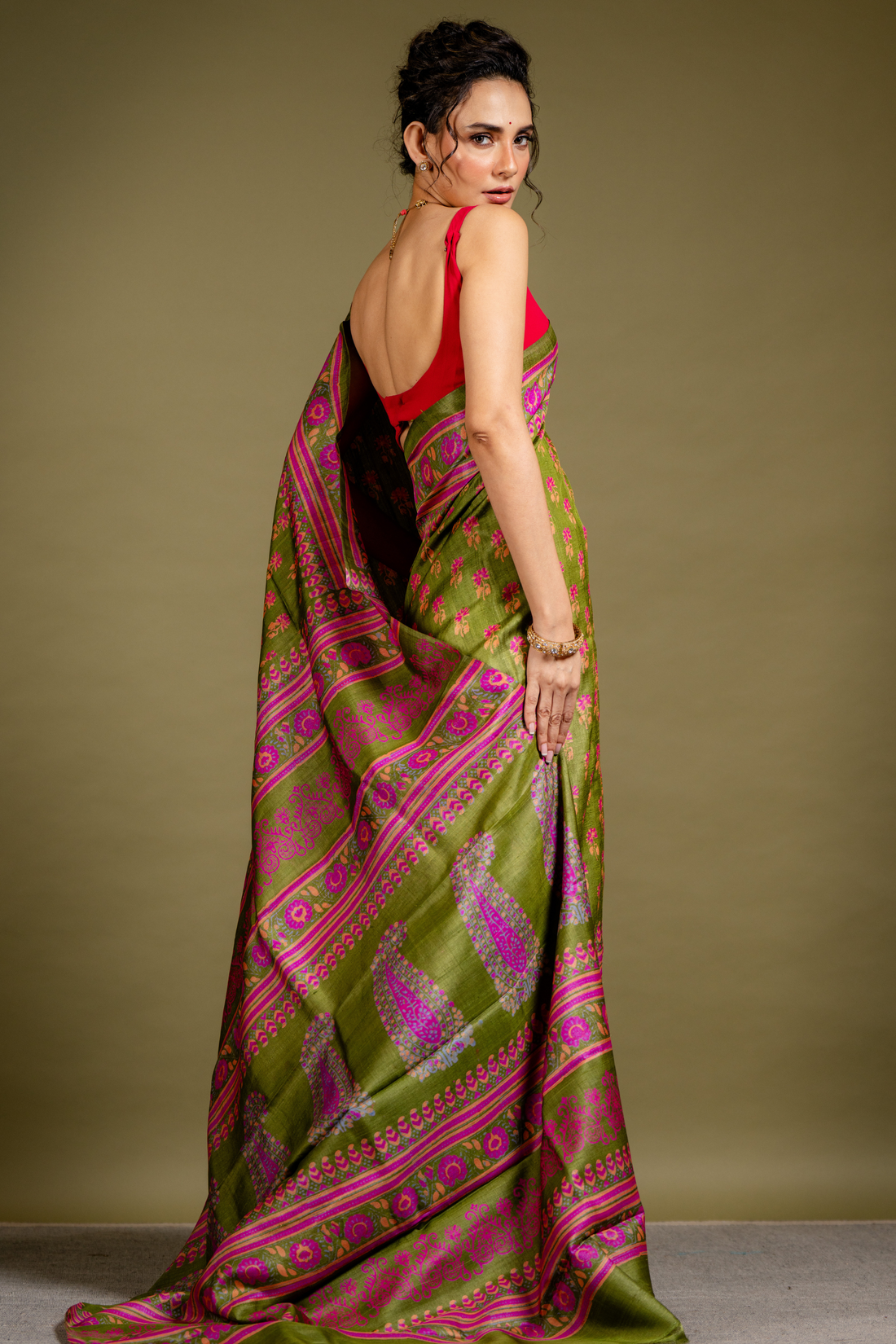 Olive Orchid Silk Saree: A Dance of Tradition in Jewel Tones