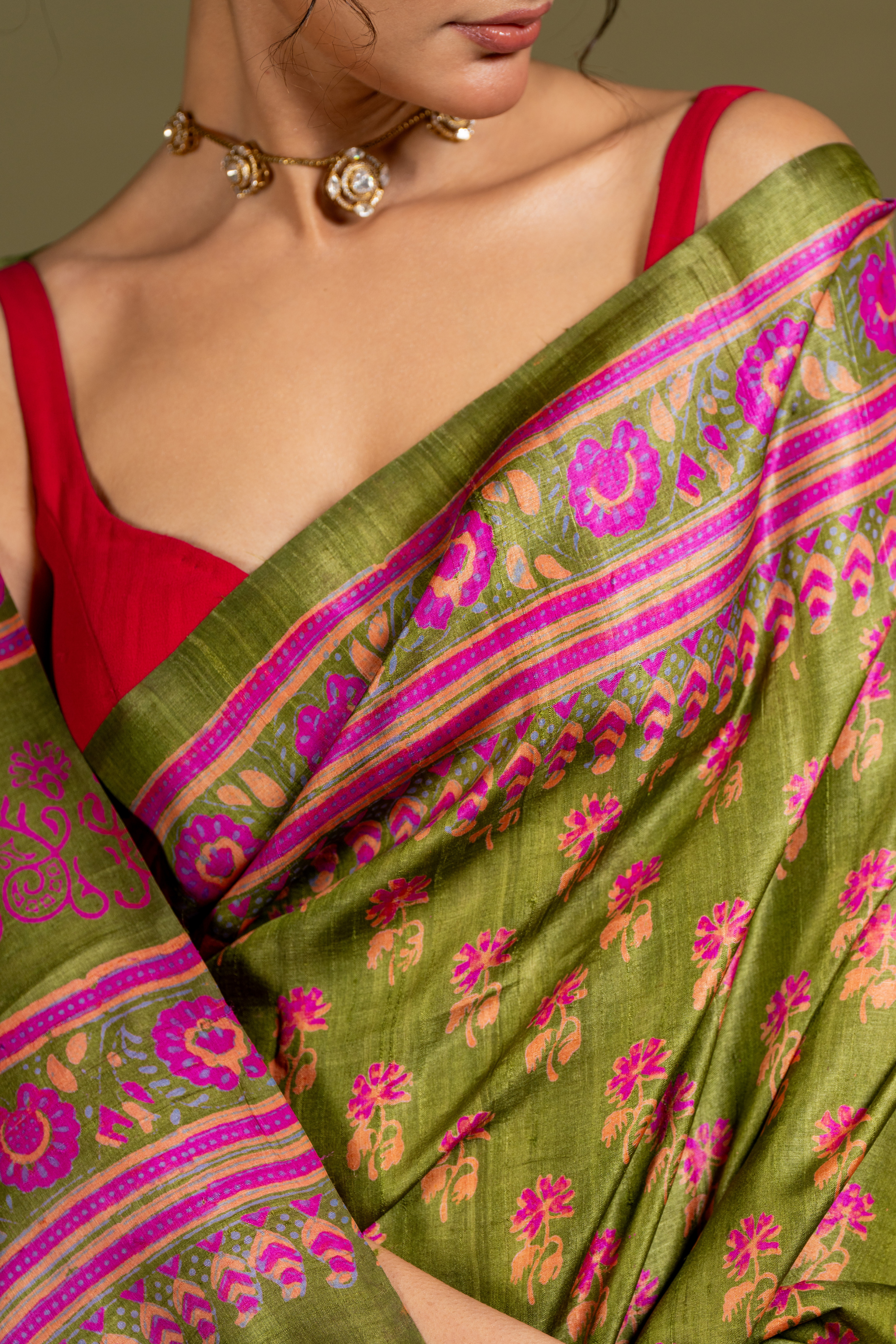 Olive Orchid Silk Saree: A Dance of Tradition in Jewel Tones