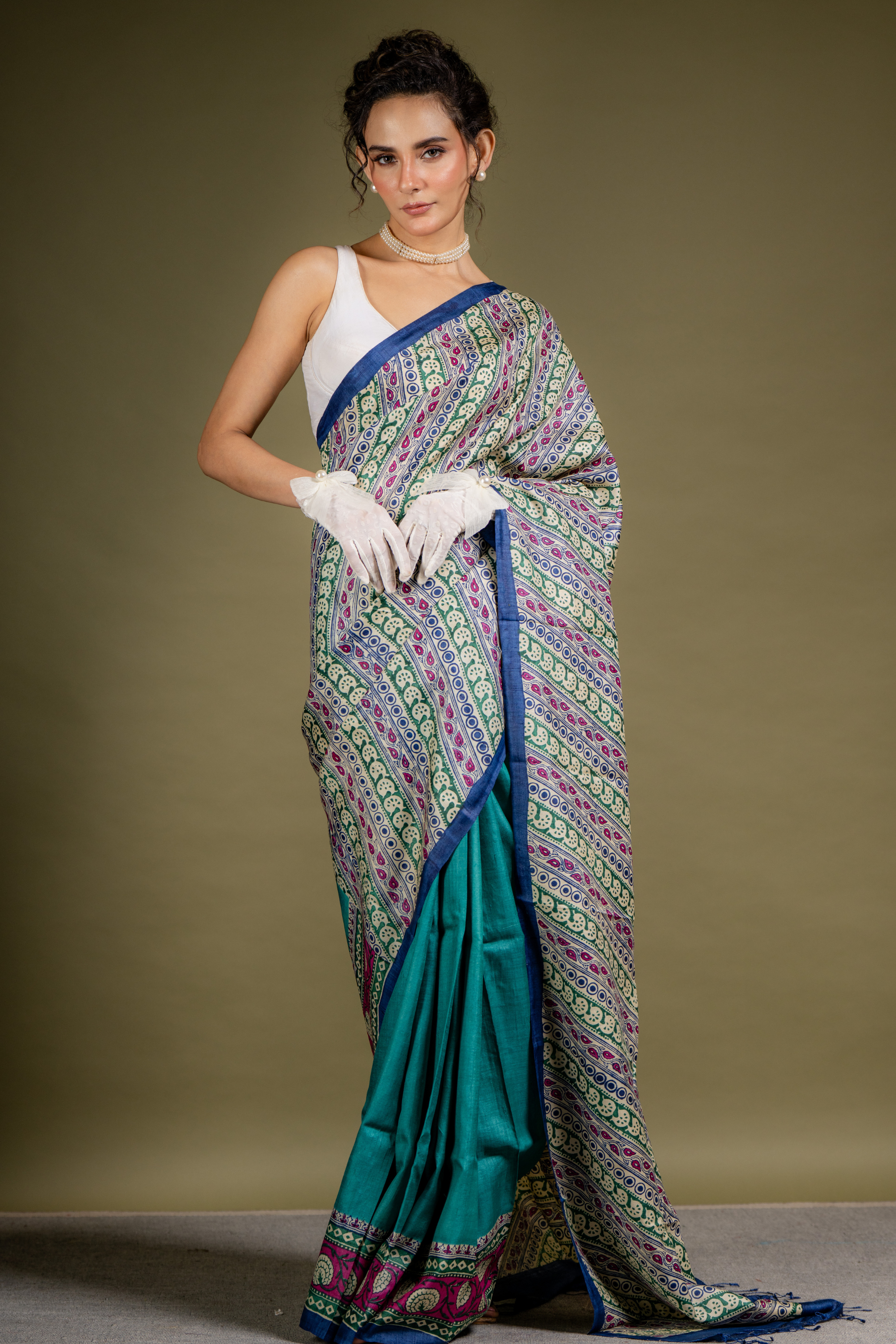 Teal Ivory Symphony Silk Saree: A Harmony of Grace and Geometric Art