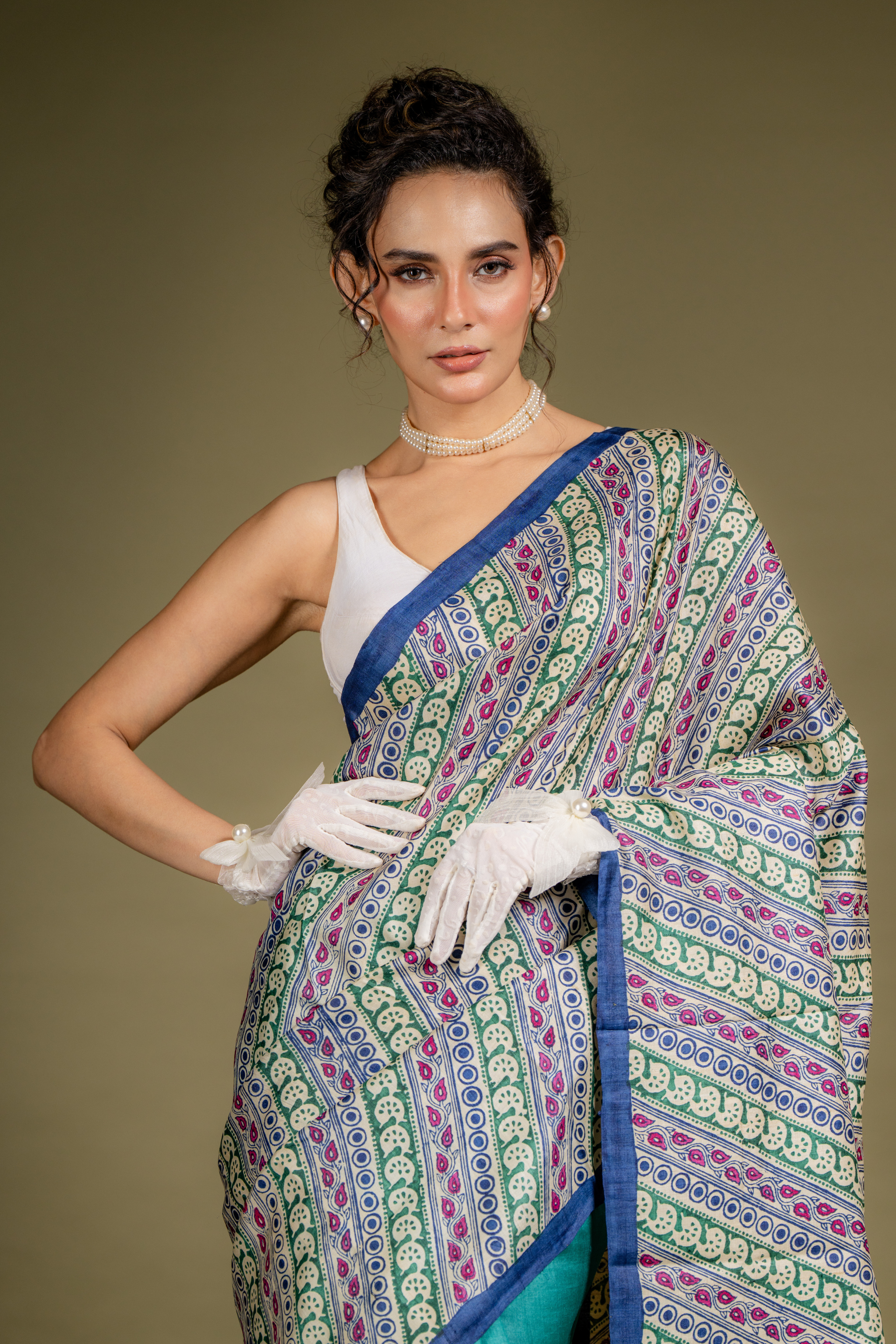 Teal Ivory Symphony Silk Saree: A Harmony of Grace and Geometric Art