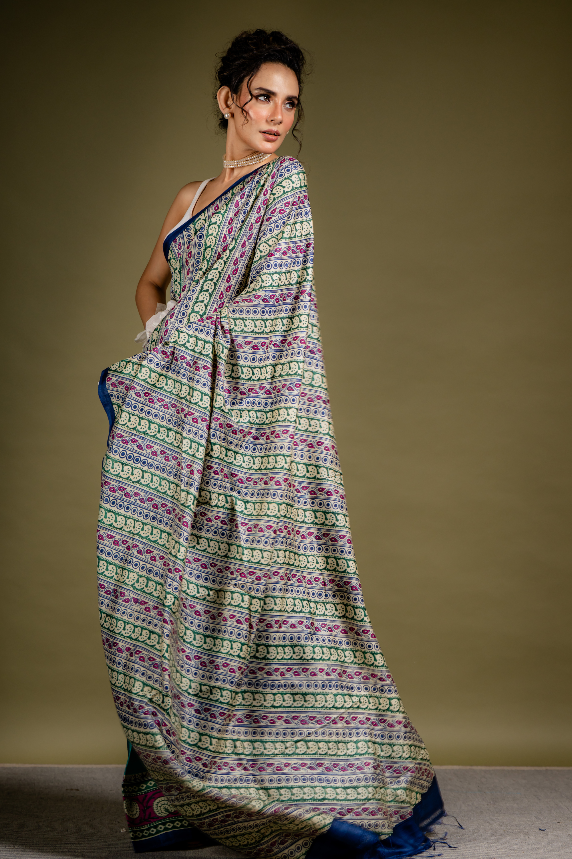 Teal Ivory Symphony Silk Saree: A Harmony of Grace and Geometric Art