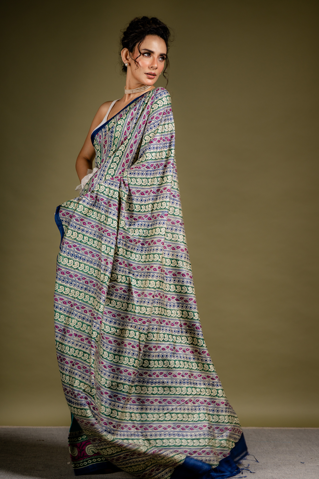 Teal Ivory Symphony Silk Saree: A Harmony of Grace and Geometric Art