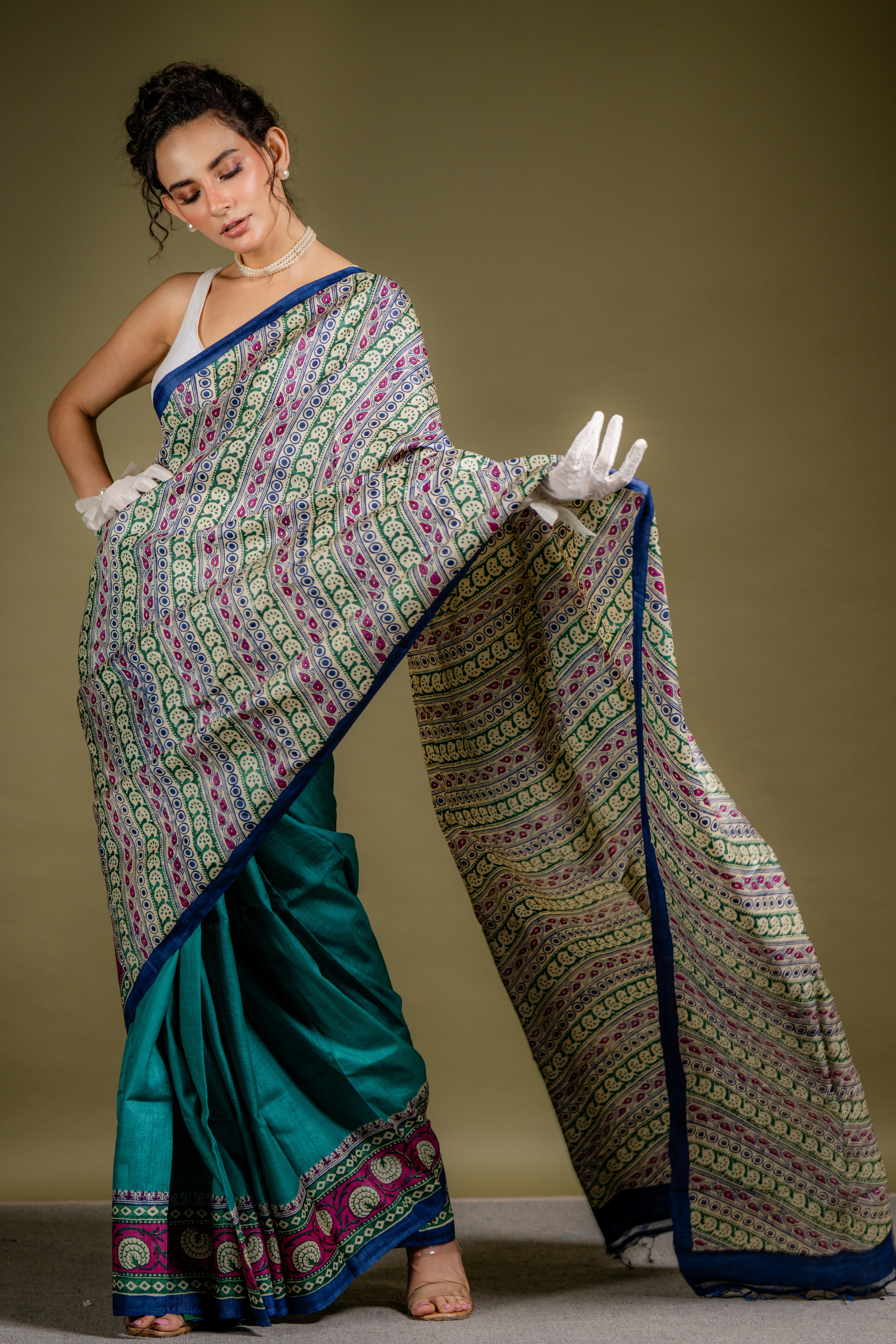 Teal Ivory Symphony Silk Saree: A Harmony of Grace and Geometric Art
