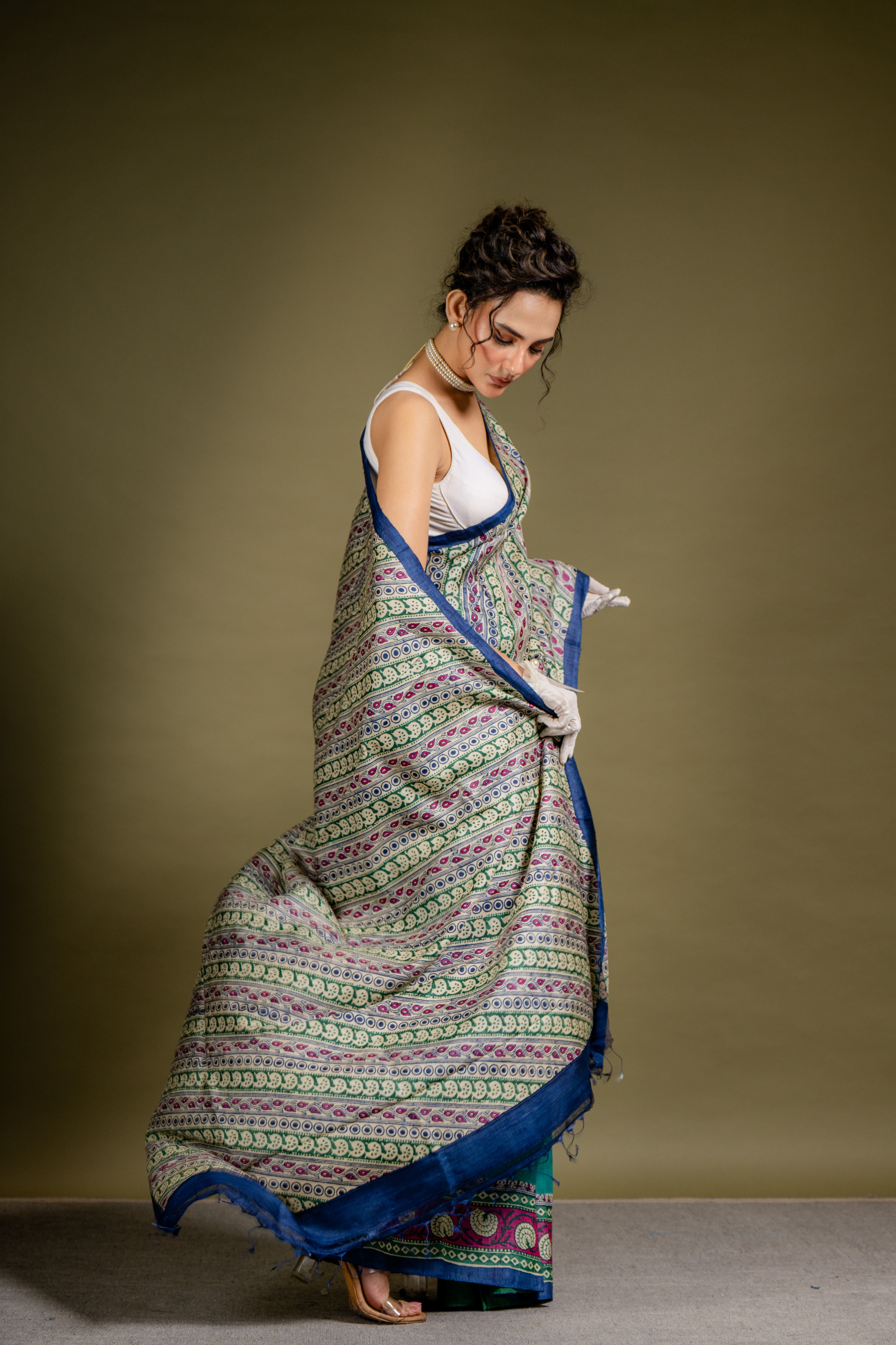 Teal Ivory Symphony Silk Saree: A Harmony of Grace and Geometric Art