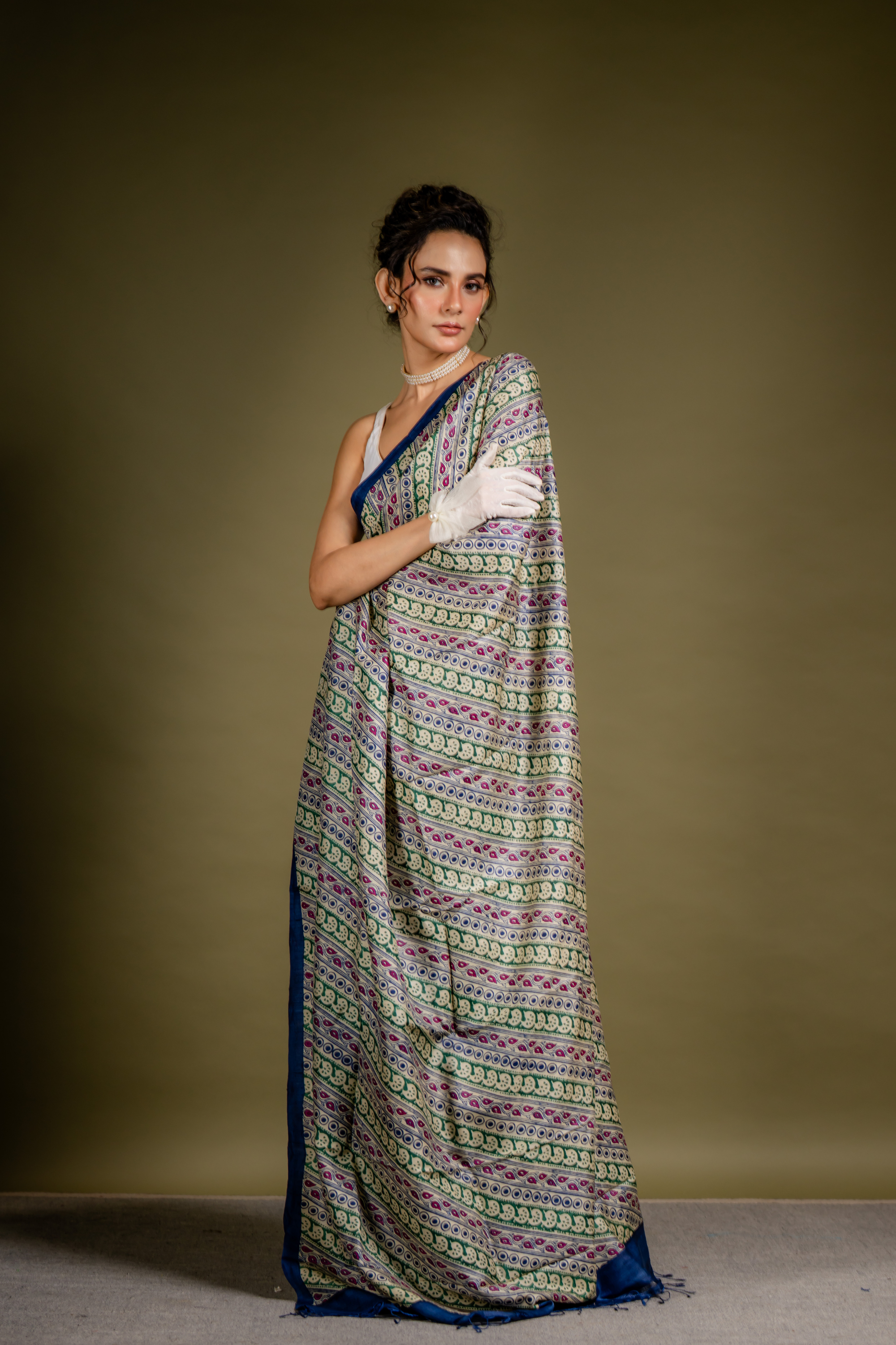 Teal Ivory Symphony Silk Saree: A Harmony of Grace and Geometric Art