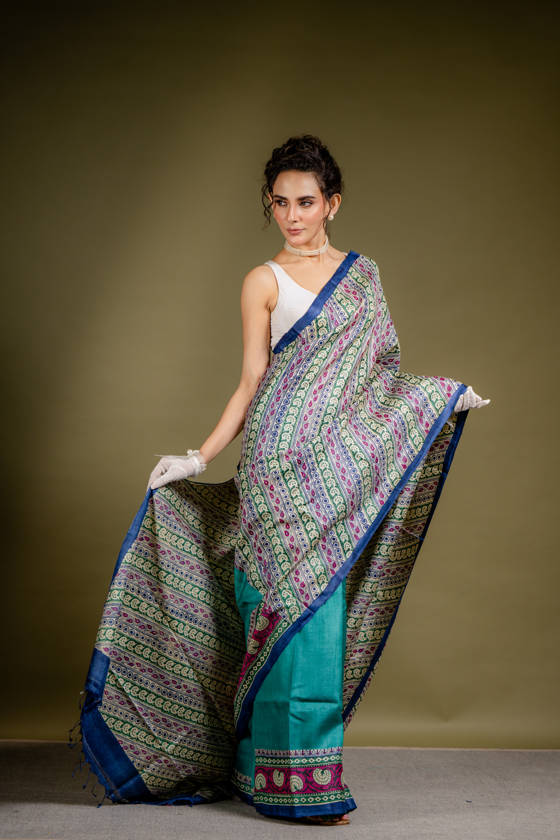Teal Ivory Symphony Silk Saree: A Harmony of Grace and Geometric Art