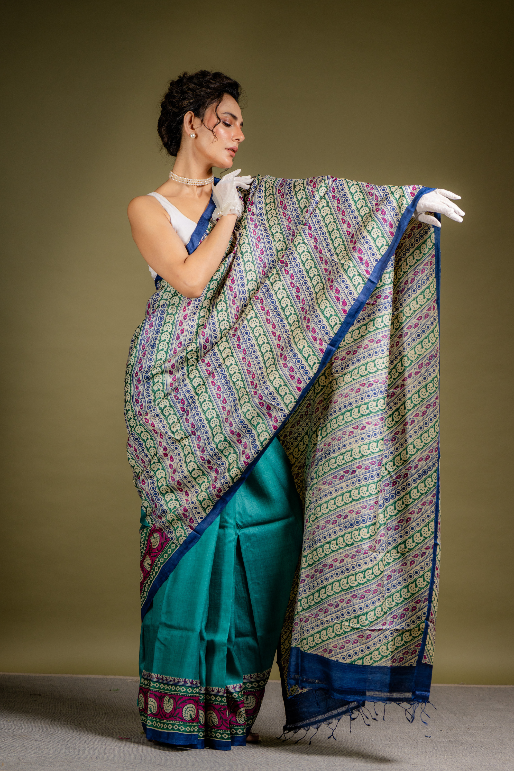 Teal Ivory Symphony Silk Saree: A Harmony of Grace and Geometric Art