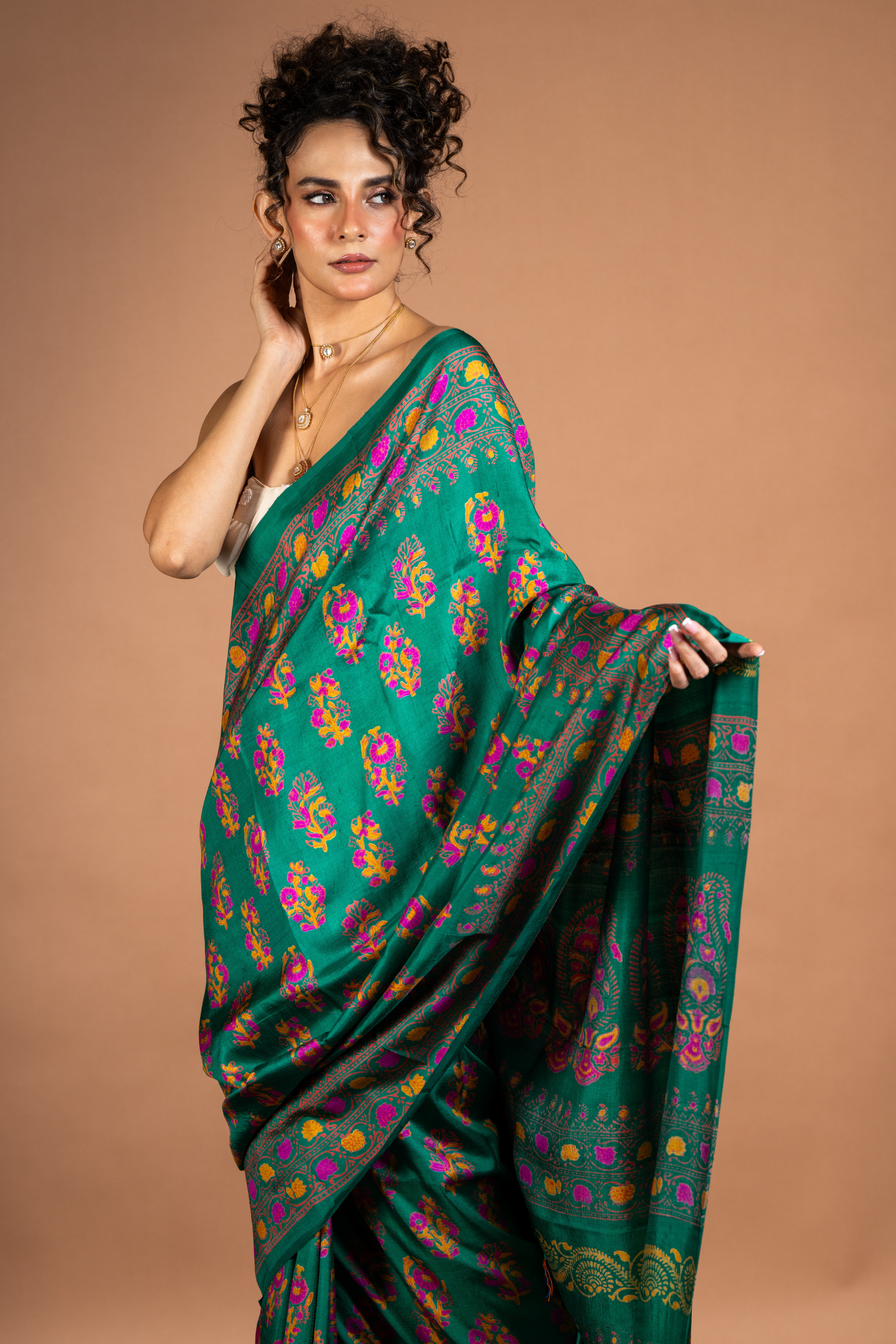 Emerald Radiance Silk Saree: A Symphony of Colour and Craft